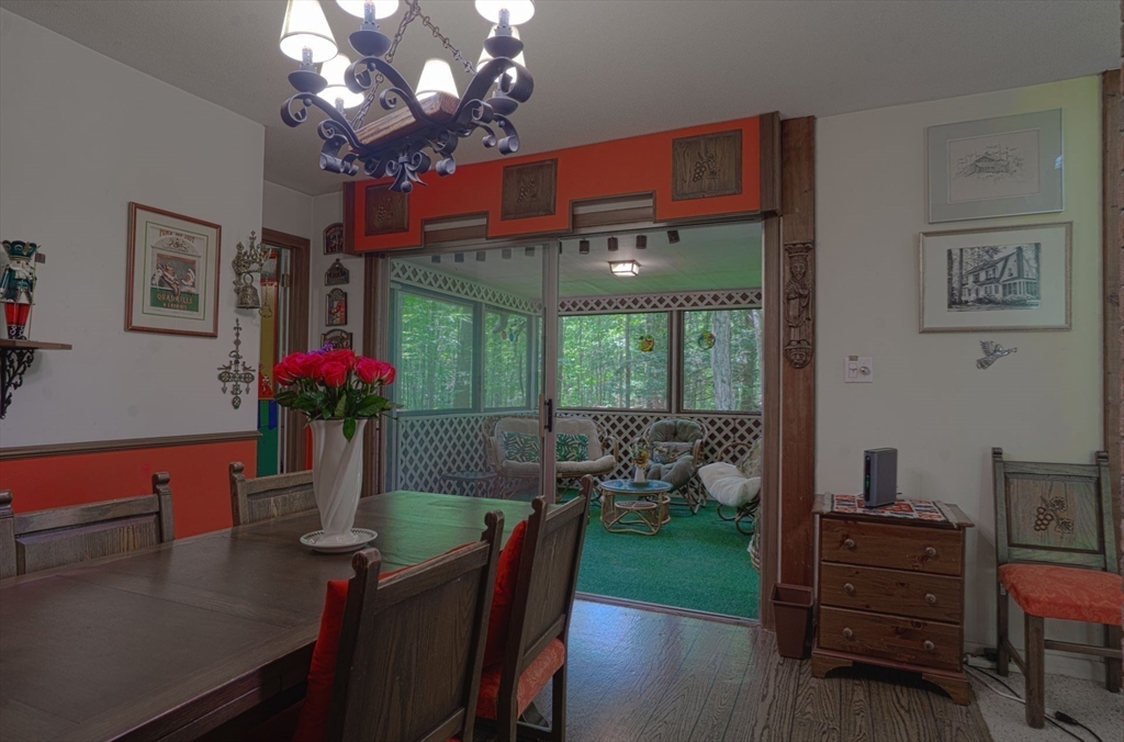 17 Juniper Lane Amherst, MA 01002 - Photo 14 of 42 a view of a dining room with furniture window and outside view
