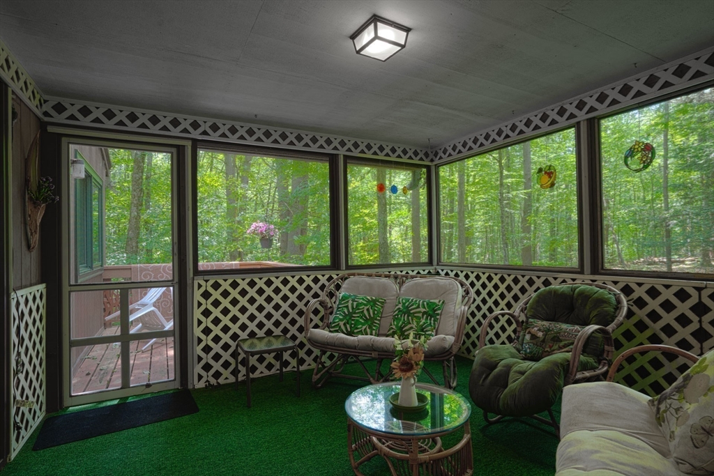 17 Juniper Lane Amherst, MA 01002 - Photo 16 of 42 a living room with furniture and a large window