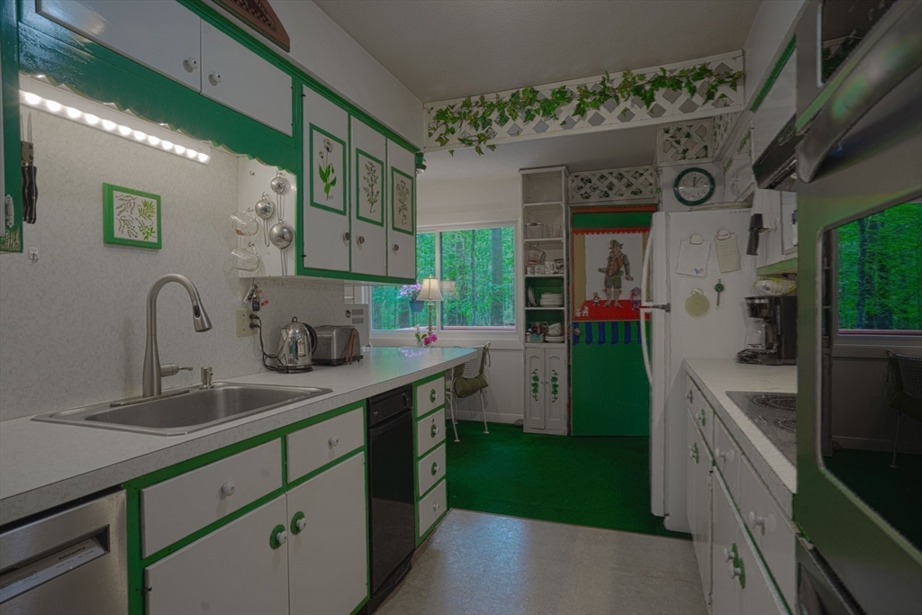 17 Juniper Lane Amherst, MA 01002 - Photo 20 of 42 a kitchen with cabinets a sink and appliances