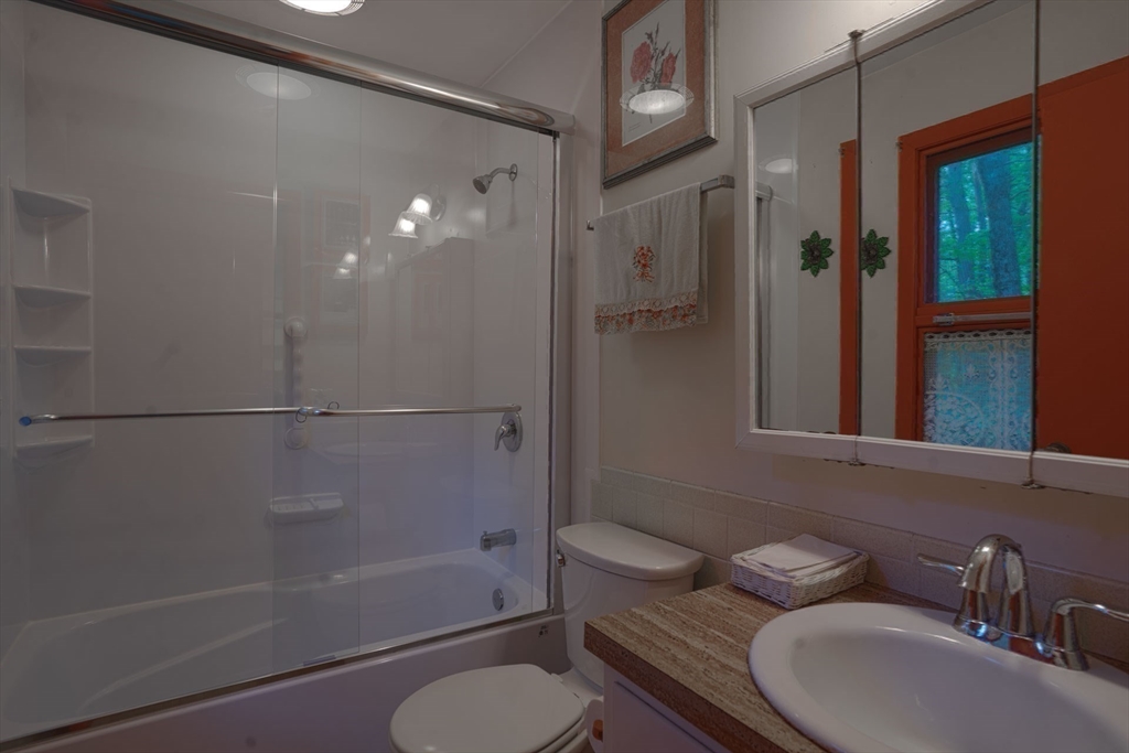 17 Juniper Lane Amherst, MA 01002 - Photo 22 of 42 a bathroom with a toilet a sink and shower