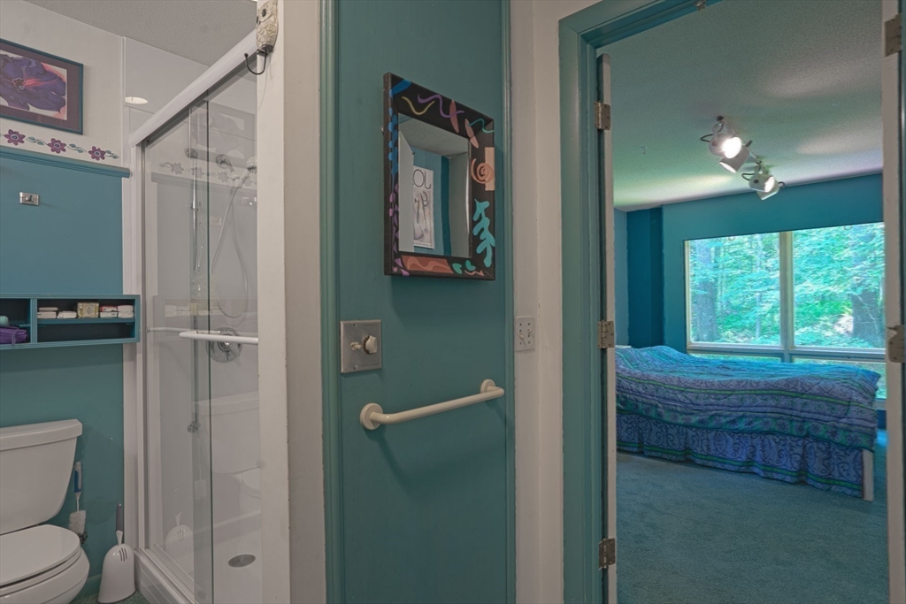17 Juniper Lane Amherst, MA 01002 - Photo 26 of 42 a bathroom with a toilet a sink and window