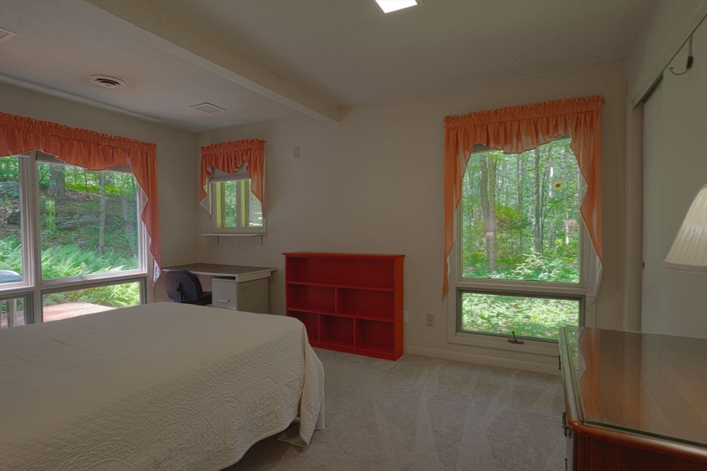 17 Juniper Lane Amherst, MA 01002 - Photo 37 of 42 a bedroom with a bed and a window