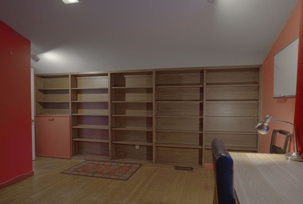 17 Juniper Lane Amherst, MA 01002 - Photo 7 of 42 a room with walk in closet and empty racks