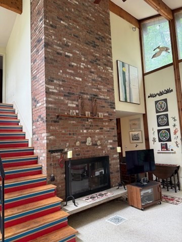 17 Juniper Lane Amherst, MA 01002 - Photo 10 of 42 a living room with furniture and a fireplace