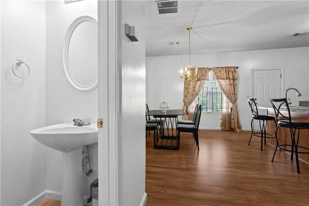 3000 Western Sunset Decatur, GA 30034 - Photo 20 of 37 a view of a dining room with furniture window and wooden floor