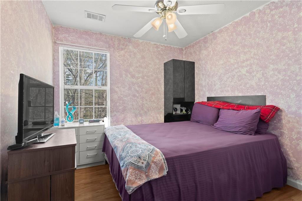 3000 Western Sunset Decatur, GA 30034 - Photo 33 of 37 a bedroom with a bed and a flat screen tv