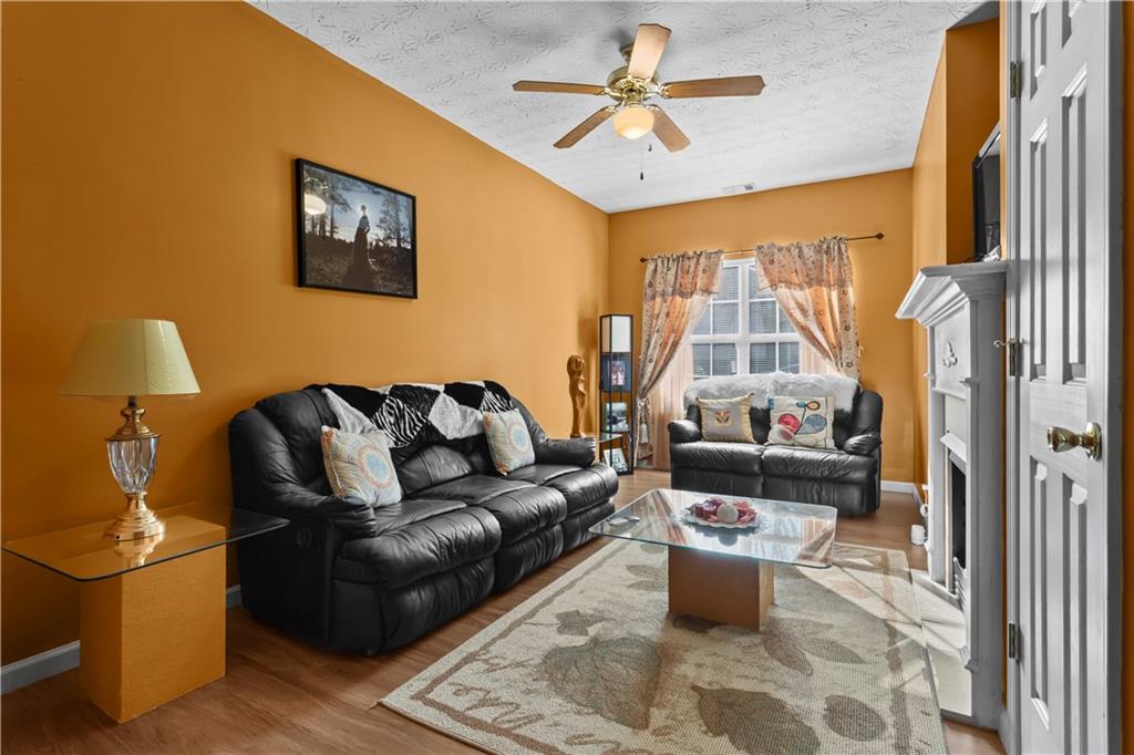 3000 Western Sunset Decatur, GA 30034 - Photo 5 of 37 a living room with furniture and a chandelier