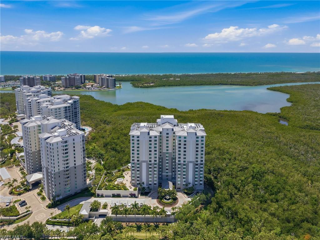 265 Indies Way, Unit 1004 Naples, FL 34110 - Photo 1 of 34 a view of a city with ocean view