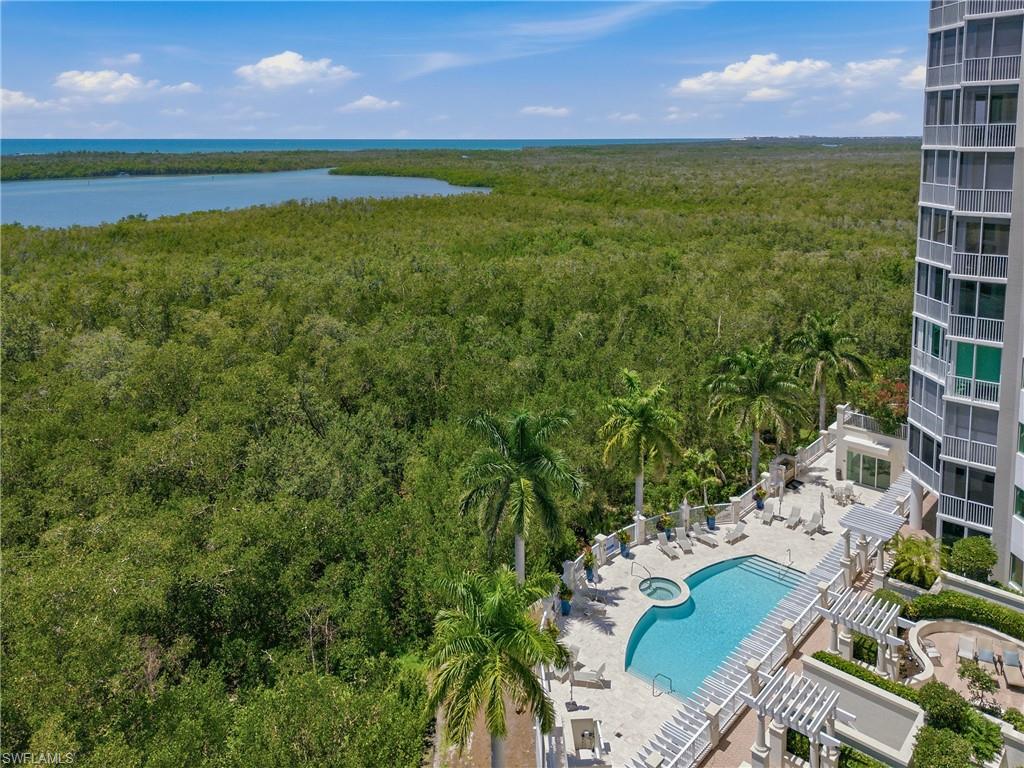 265 Indies Way, Unit 1004 Naples, FL 34110 - Photo 28 of 34 a view of an outdoor space and a yard