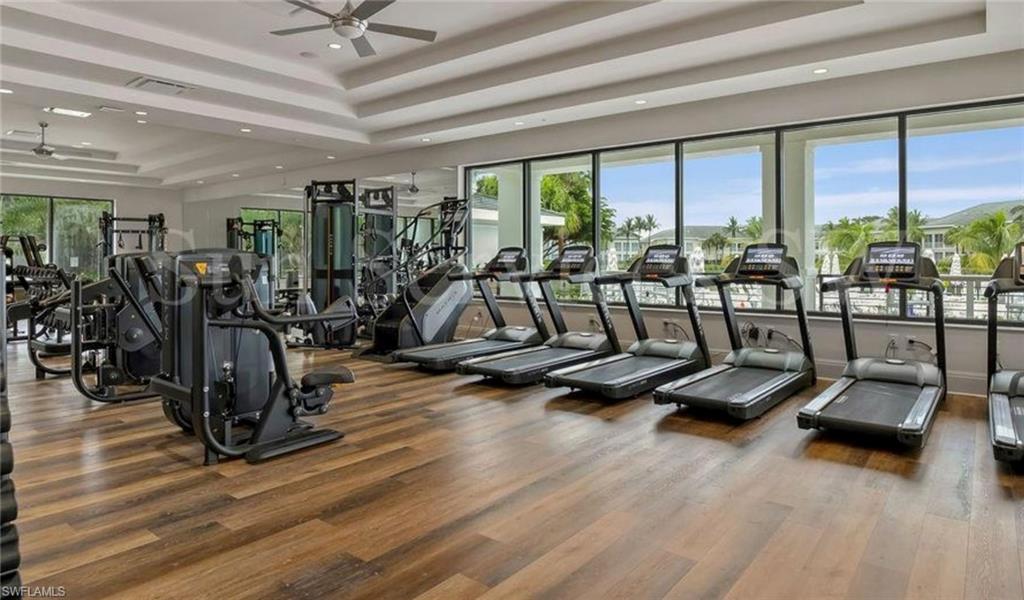 265 Indies Way, Unit 1004 Naples, FL 34110 - Photo 34 of 34 a view of a room with gym equipment