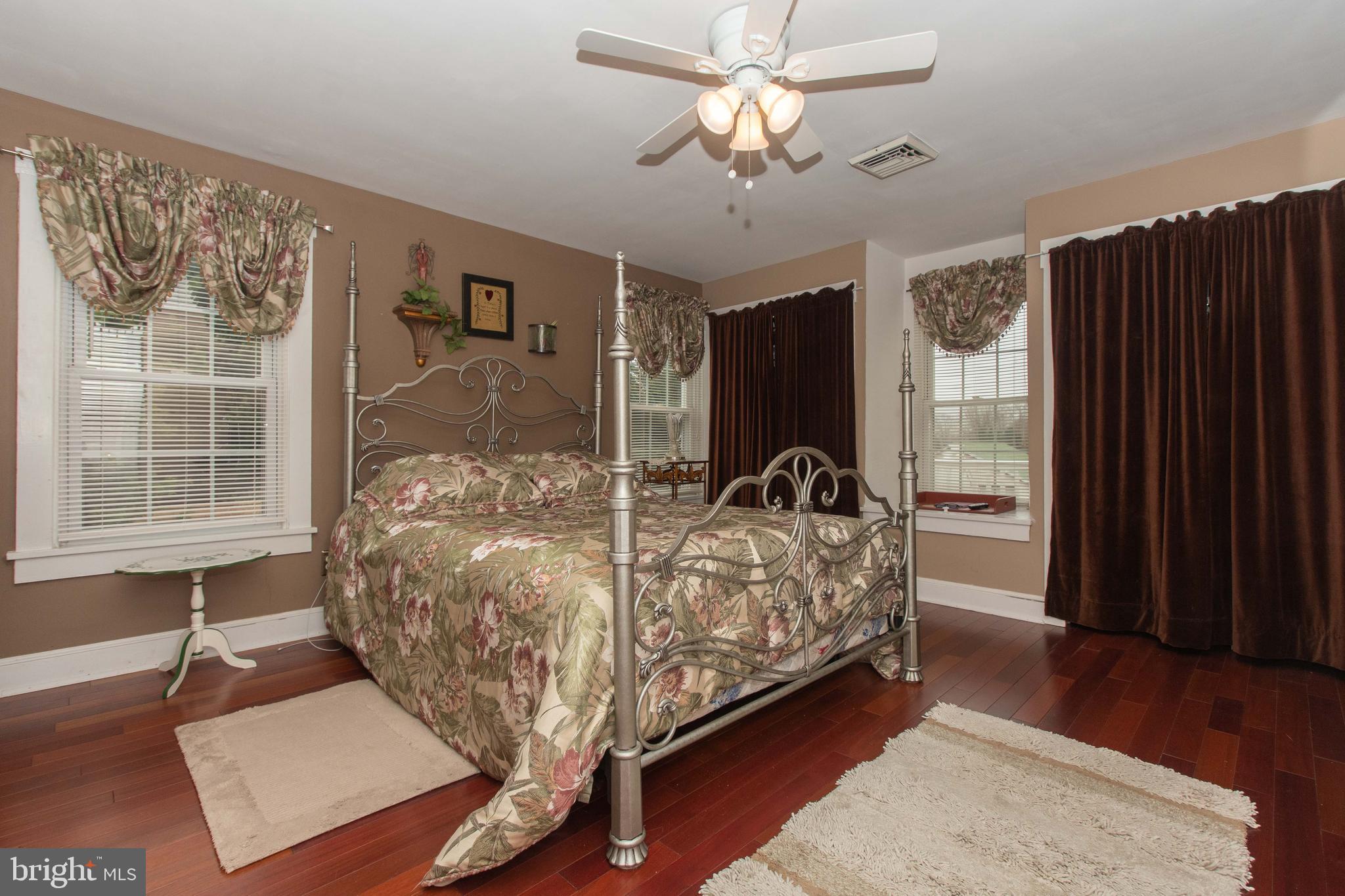 2205 Harford Road Fallston, MD 21047 - Photo 40 of 53 Ceiling Fan & hardwood floor