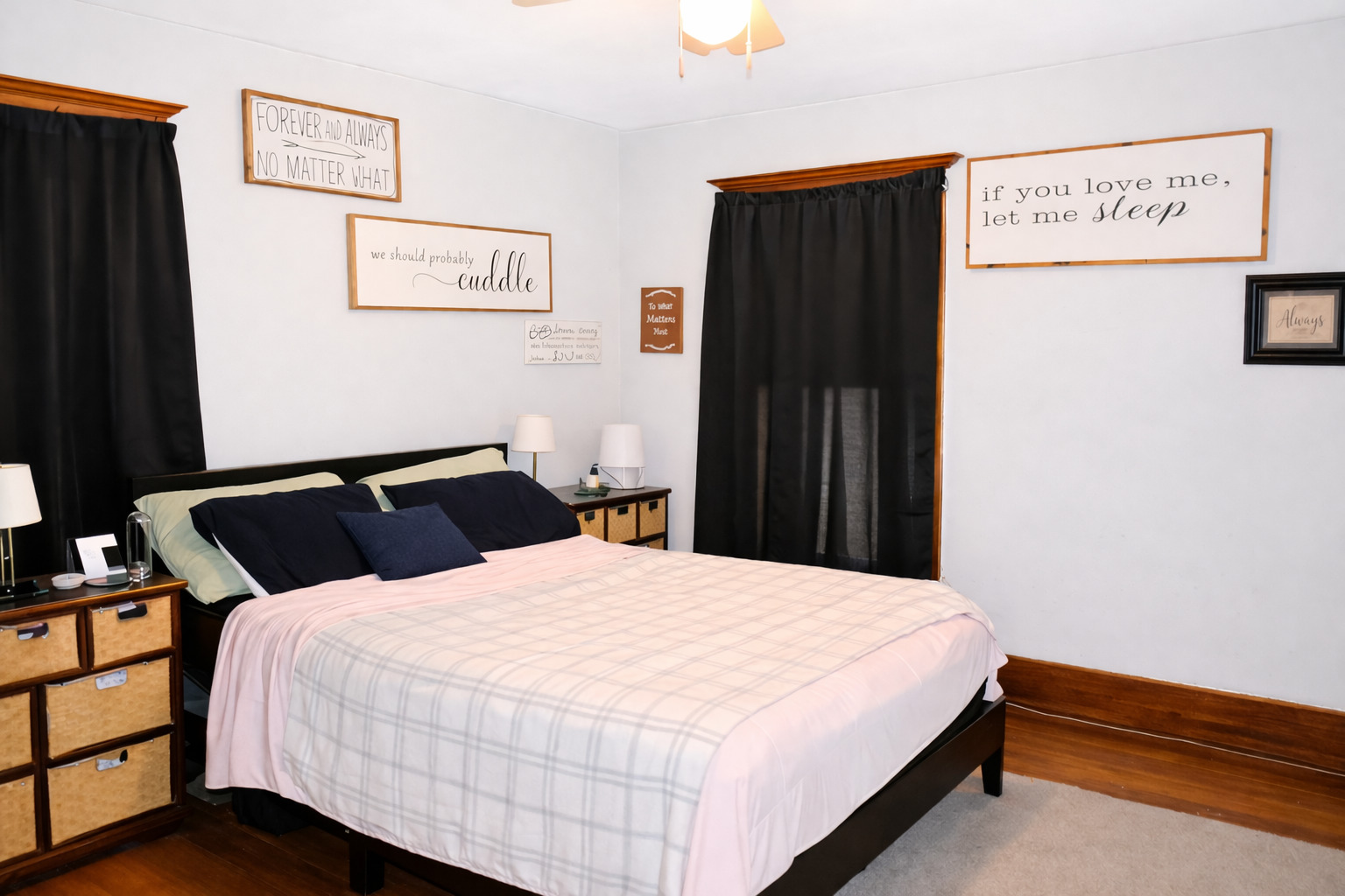 112 7th Avenue Sterling, IL 61081 - Photo 14 of 18 a bedroom with a bed and wooden floor