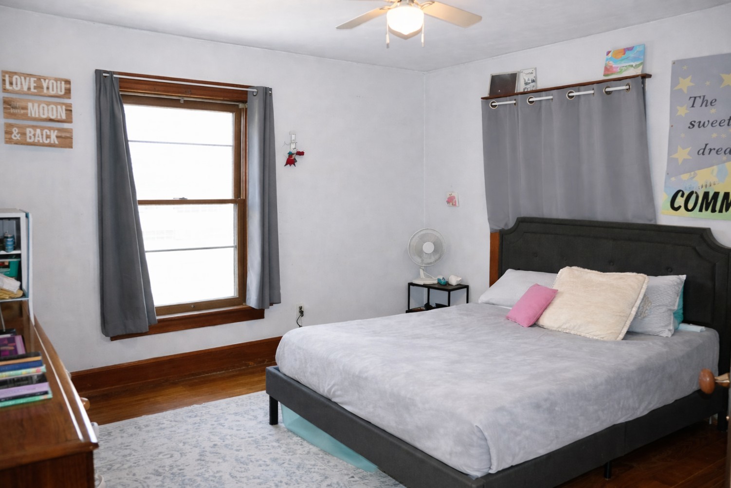 112 7th Avenue Sterling, IL 61081 - Photo 15 of 18 a bedroom with a bed and a window