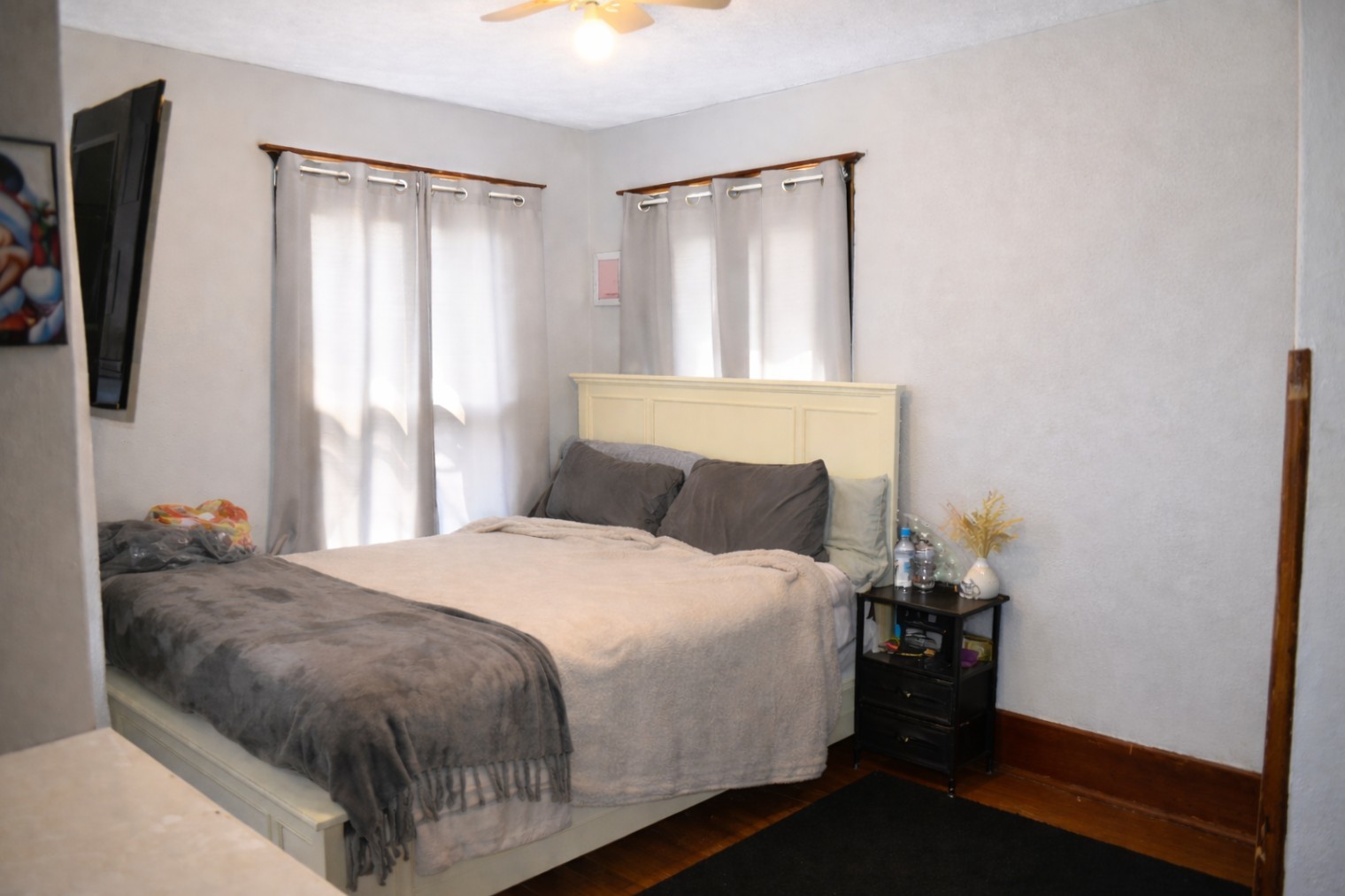 112 7th Avenue Sterling, IL 61081 - Photo 16 of 18 a bedroom with a bed and a window