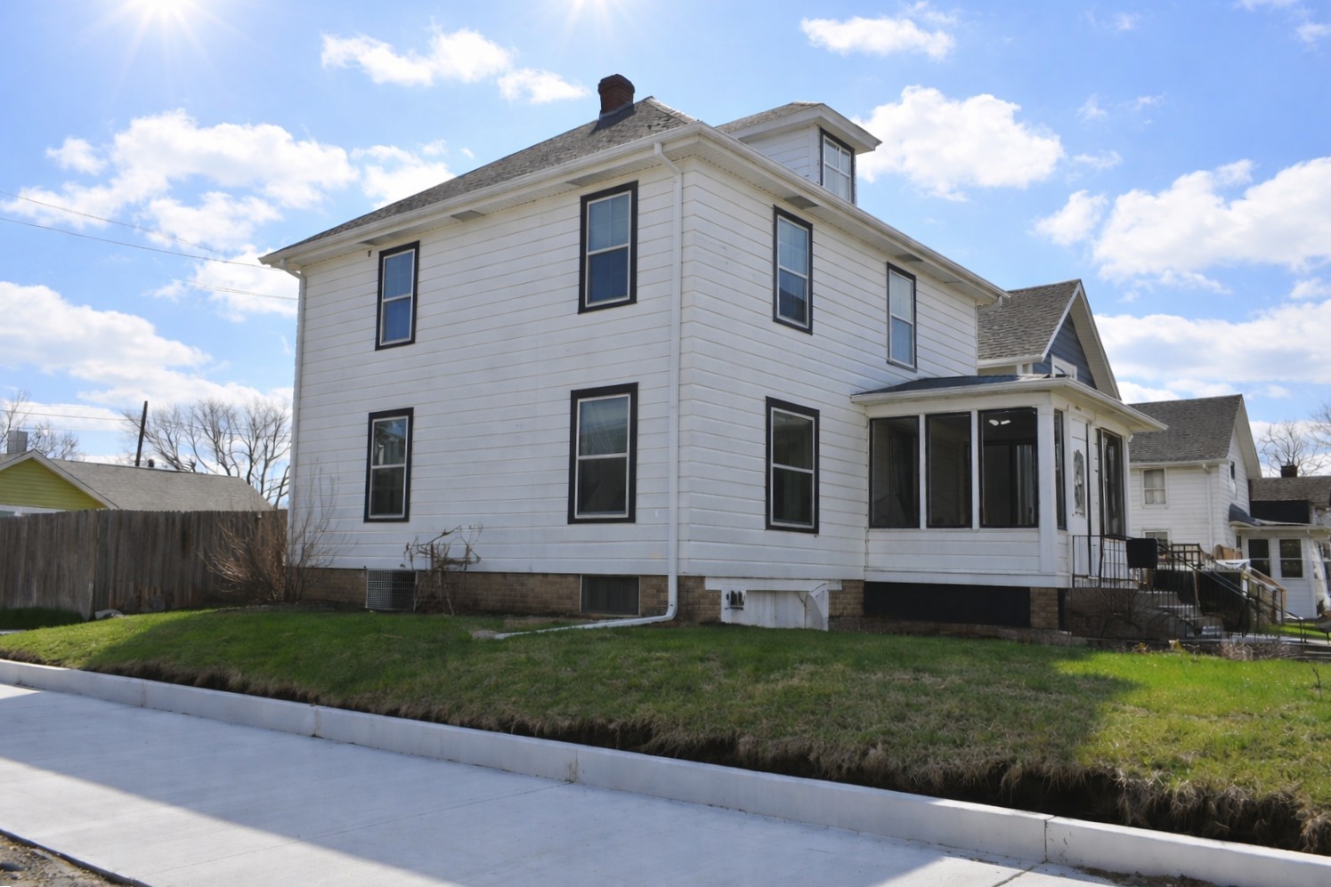 112 7th Avenue Sterling, IL 61081 - Photo 2 of 18 a view of a house with a yard