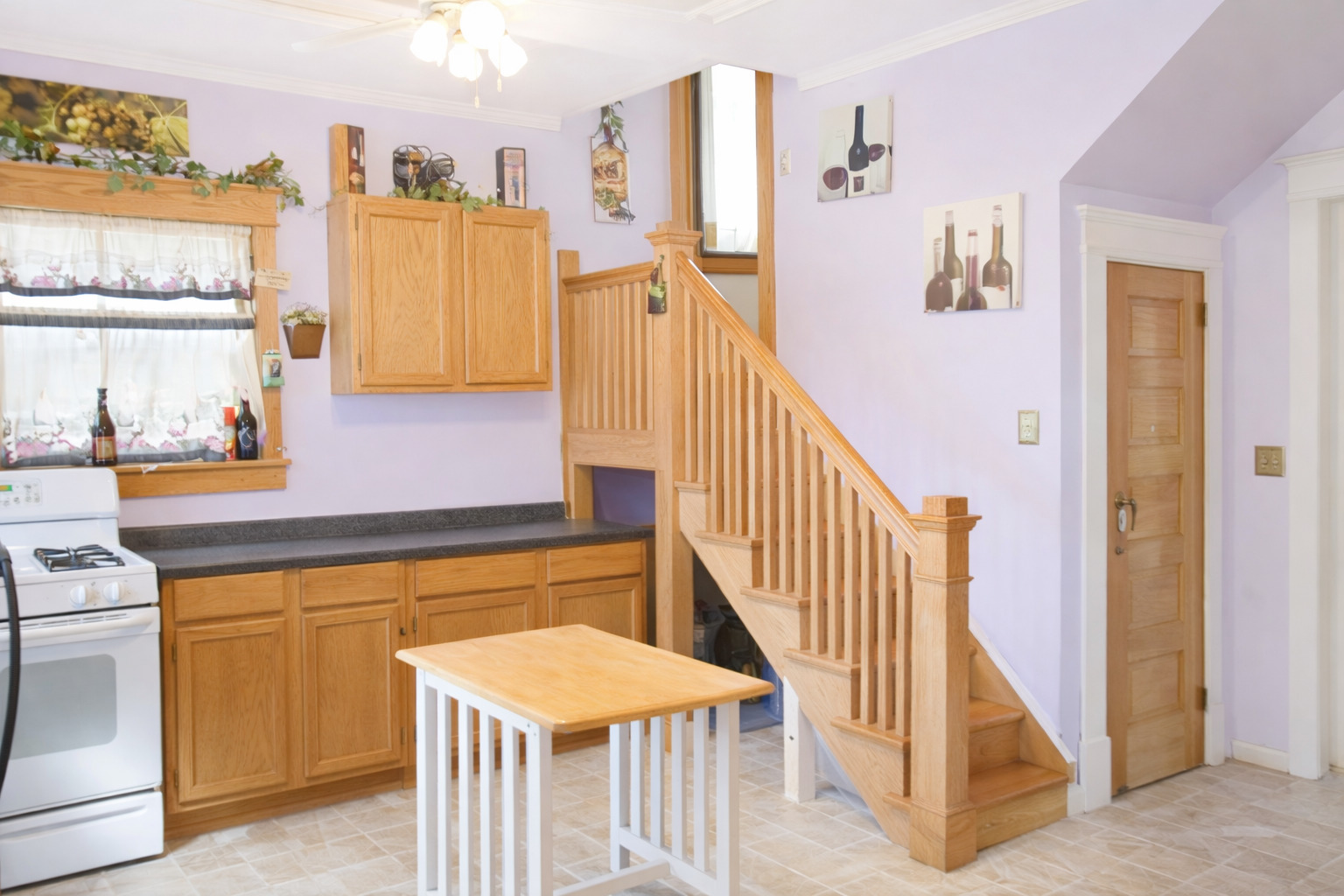 112 7th Avenue Sterling, IL 61081 - Photo 6 of 18 a hallway with a stove a washer and dryer