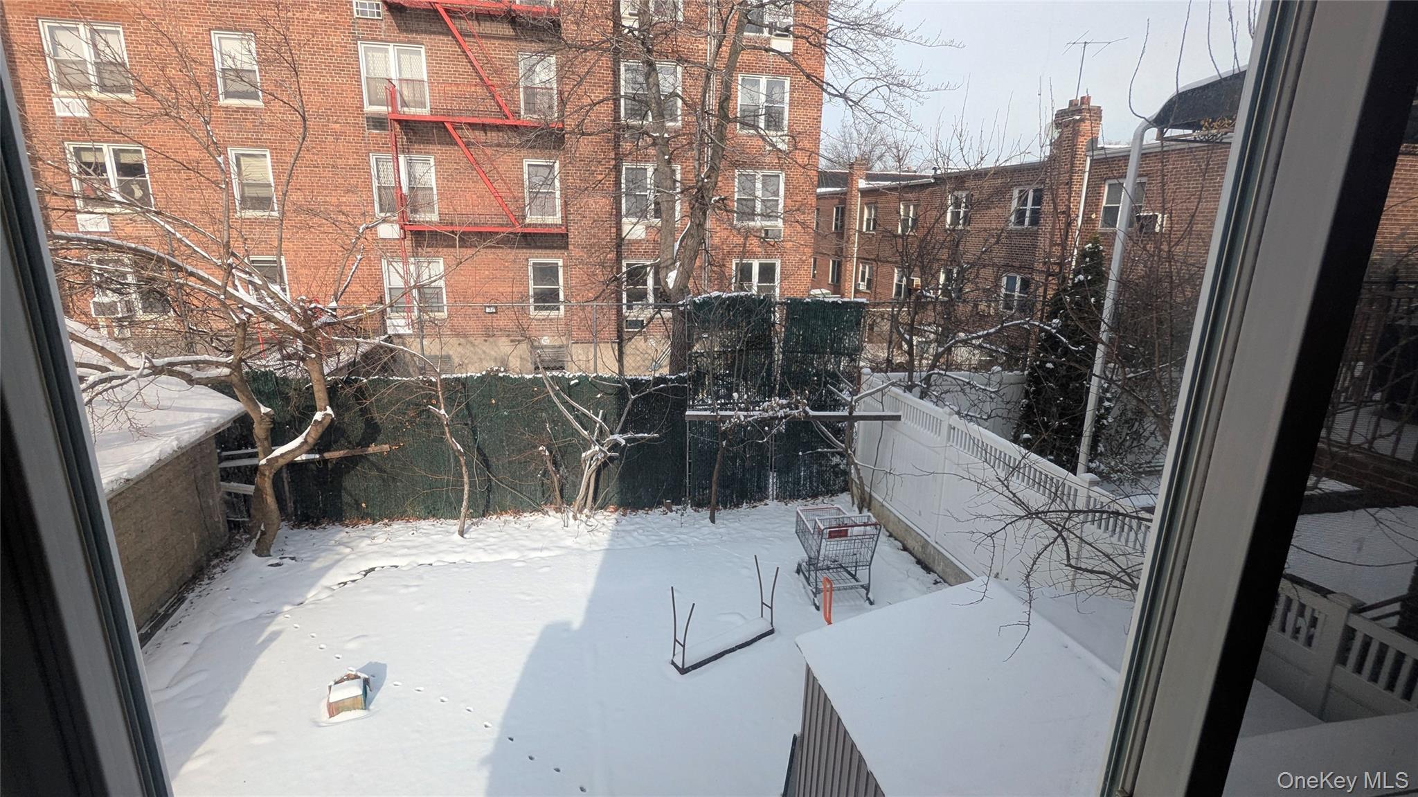 99-47 62nd Road Queens, NY 11374 - Photo 21 of 21 View of snow covered patio