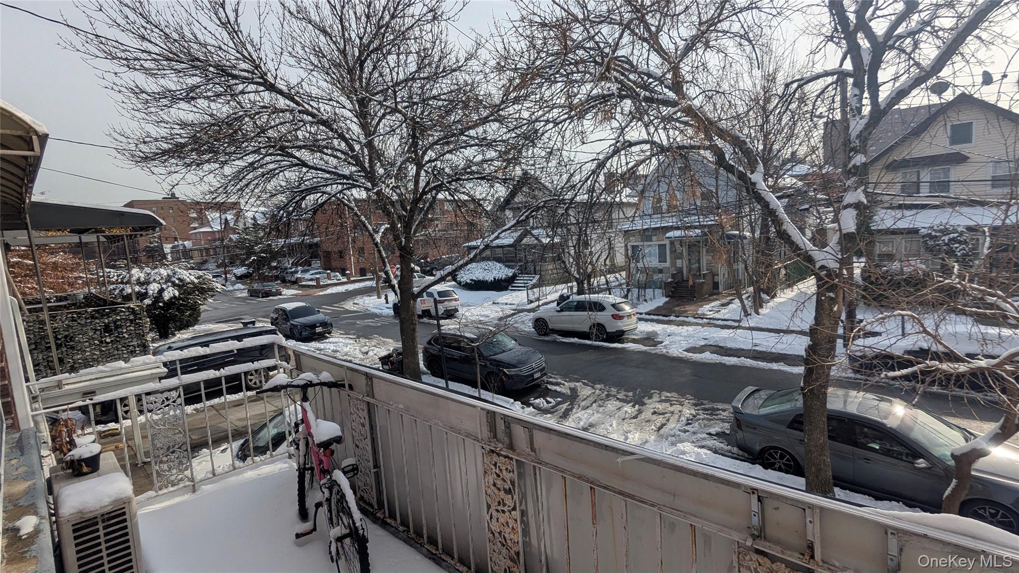99-47 62nd Road Queens, NY 11374 - Photo 5 of 21 Snow covered back of property with a residential view