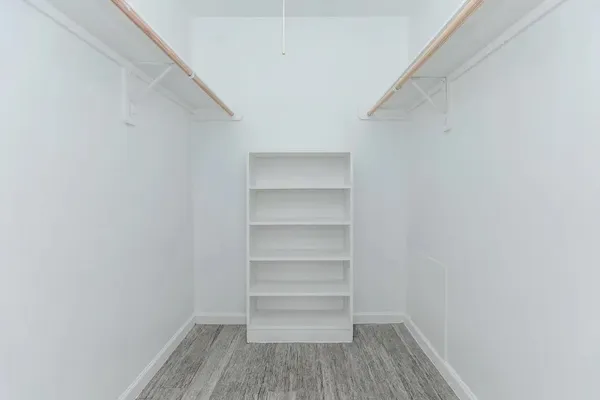 a bathroom with a toilet and a tub