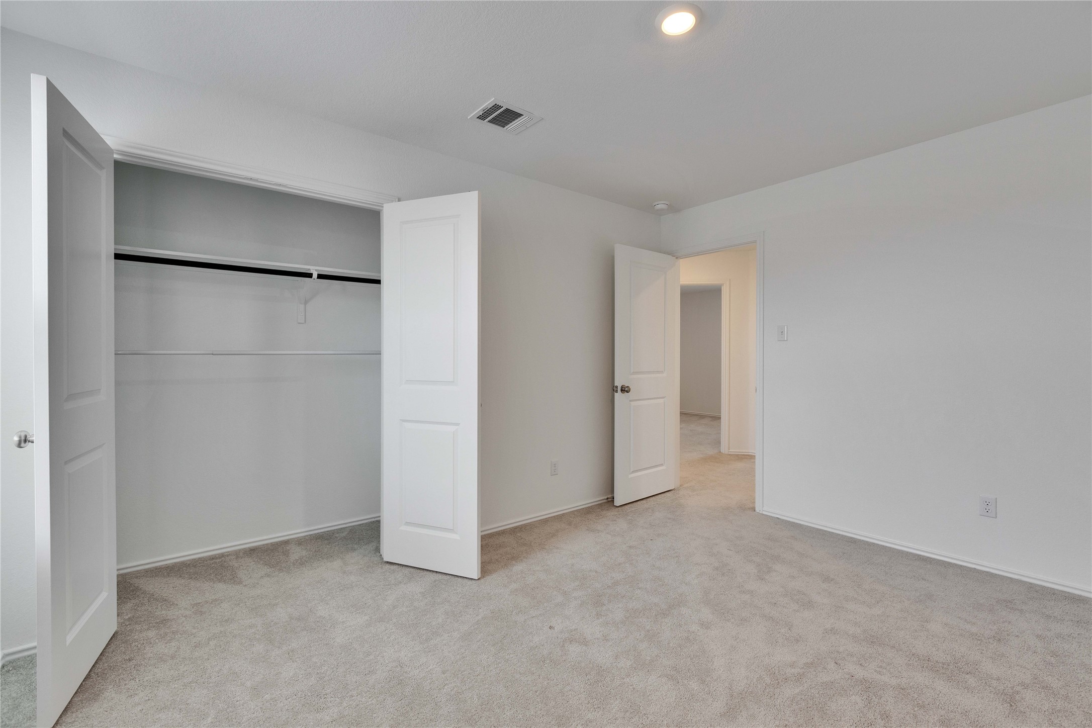 206 Canley Loop Hutto, TX 78634 - Photo 24 of 31 Upstairs bedroom with a walk in closet.