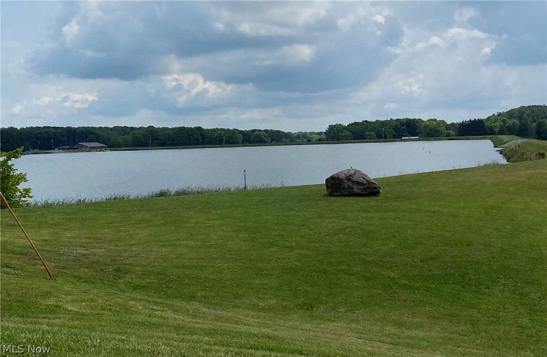 7443 Spillway Road, Unit 57 Lisbon, OH 44432 - Photo 16 of 17 Five minute walk to Guilford Lake from backyard