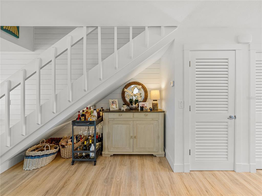 420 Gulf Boulevard, Unit 4 Boca Grande, FL 33921 - Photo 11 of 40 a view of a room with wooden floor and a window