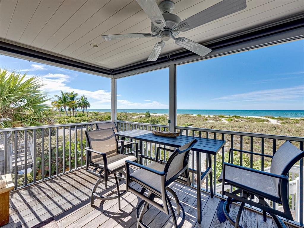 420 Gulf Boulevard, Unit 4 Boca Grande, FL 33921 - Photo 20 of 40 a view of a balcony with furniture