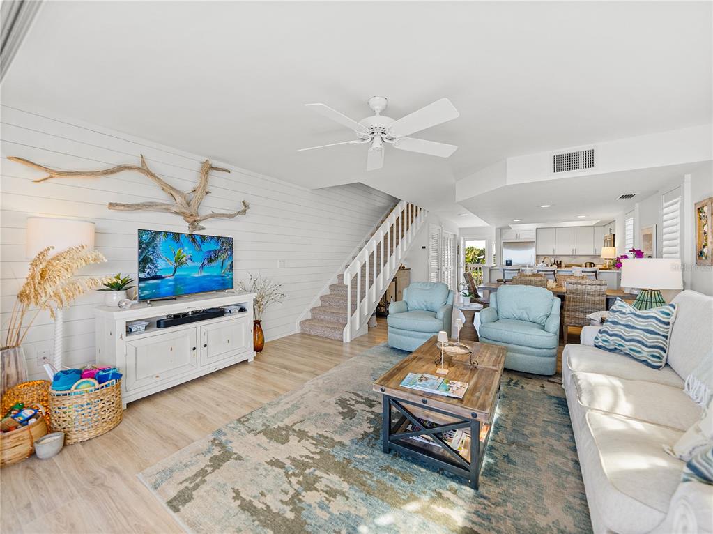 420 Gulf Boulevard, Unit 4 Boca Grande, FL 33921 - Photo 22 of 40 a living room with furniture and a flat screen tv