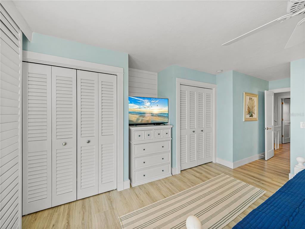 420 Gulf Boulevard, Unit 4 Boca Grande, FL 33921 - Photo 30 of 40 a view of a bedroom with wooden floor