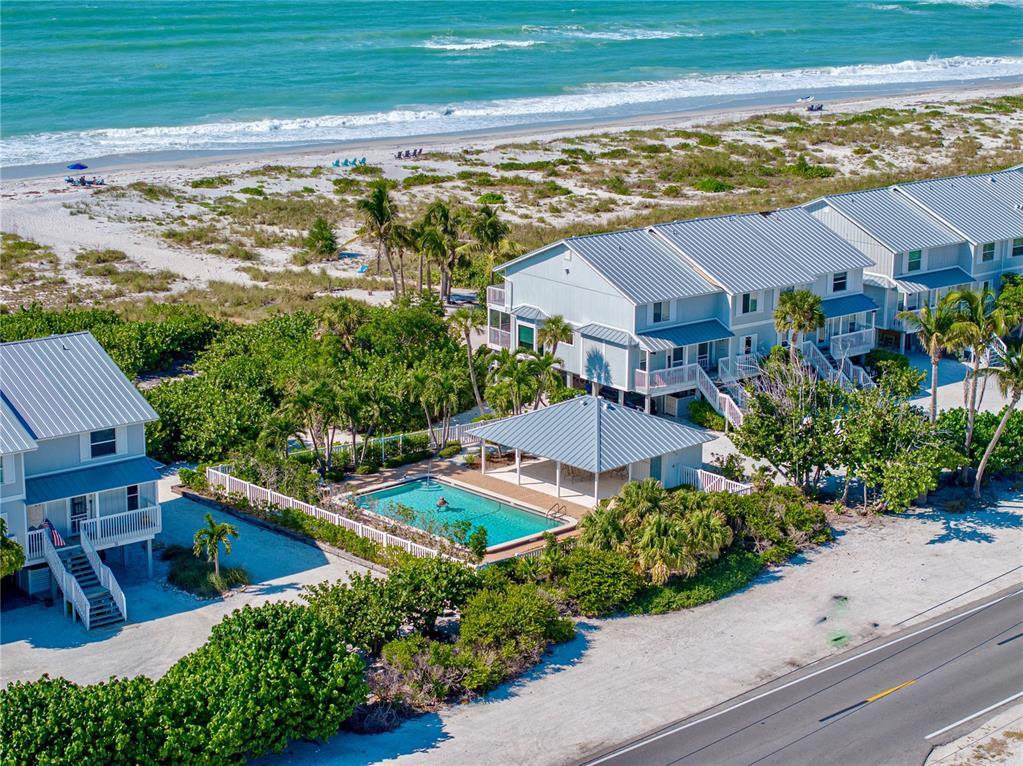 420 Gulf Boulevard, Unit 4 Boca Grande, FL 33921 - Photo 40 of 40 an aerial view of residential houses with outdoor space and trees