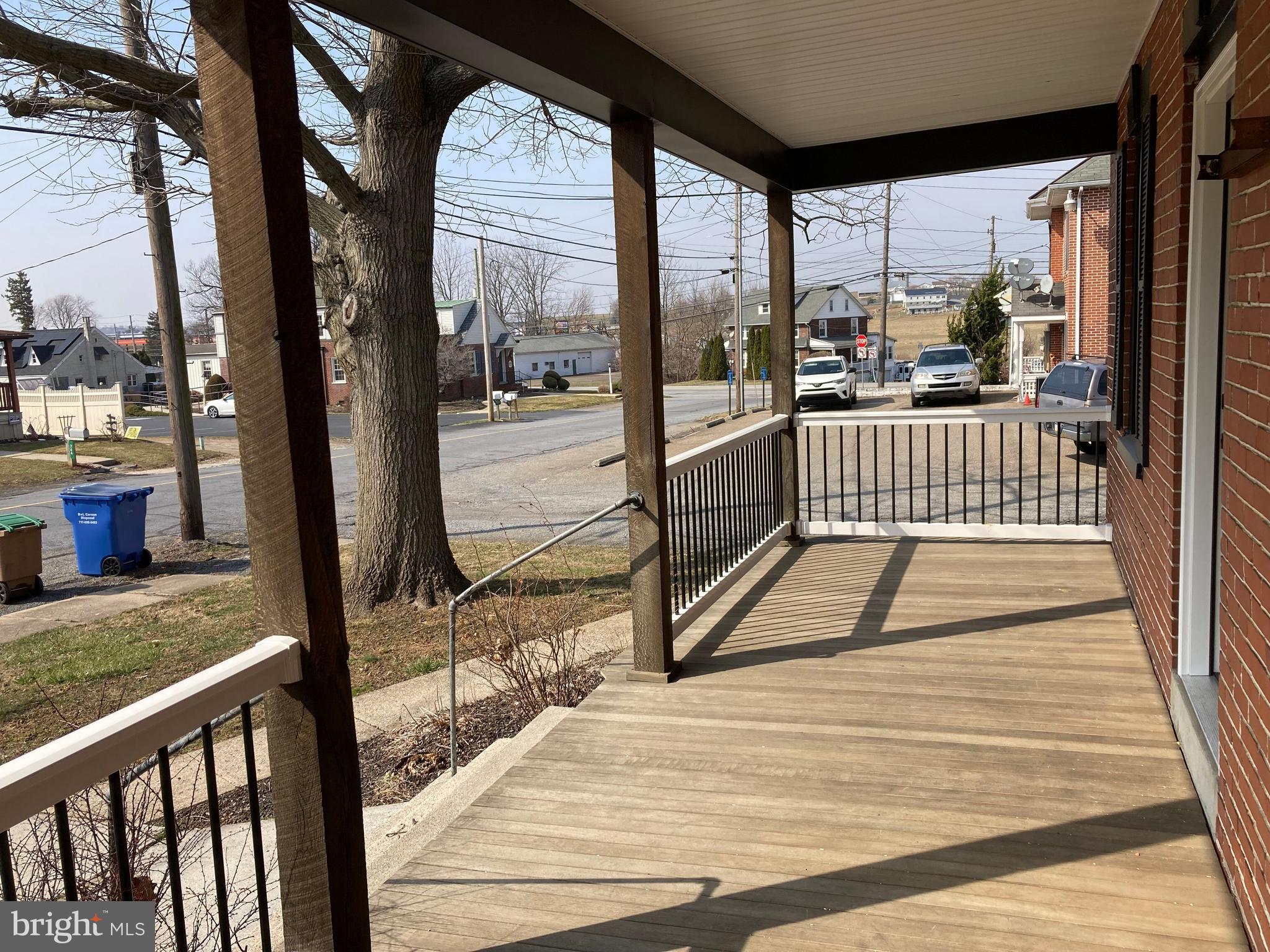 747 Bellevue Avenue Gap, PA 17527 - Photo 9 of 16 a view of a room with wooden floor and floor to ceiling window