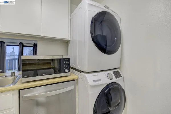 a view of balcony with furniture