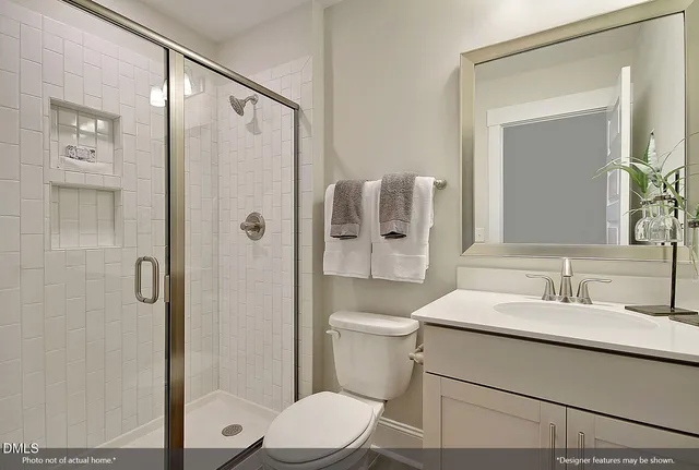 a bedroom with two beds and a window