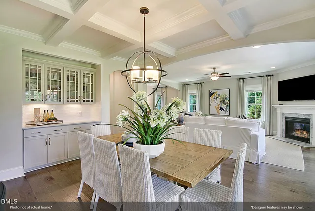 a kitchen with sink refrigerator and window