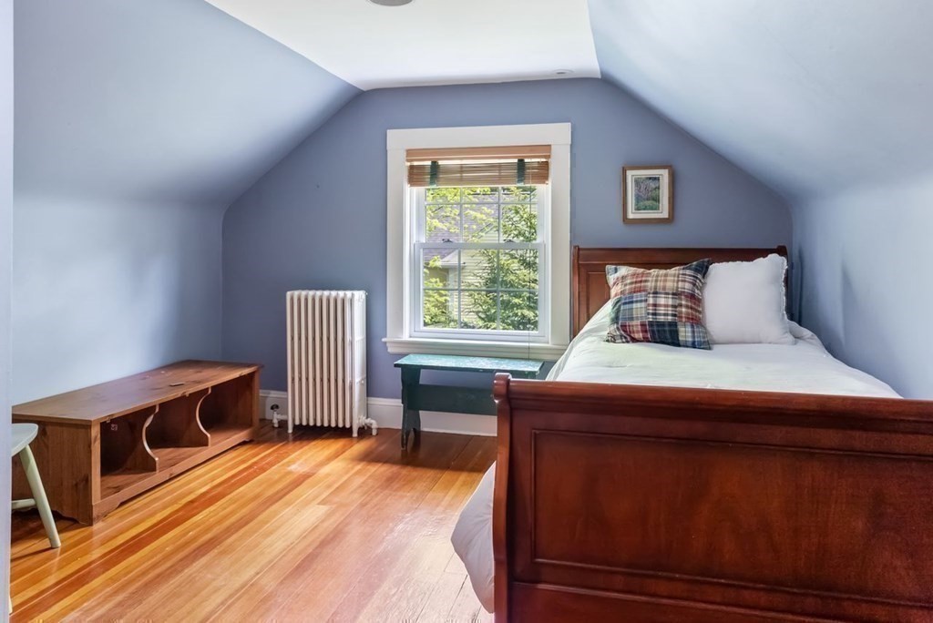 120 Forest Street Wellesley, MA 02481 - Photo 19 of 24 a bedroom with a bed and a window