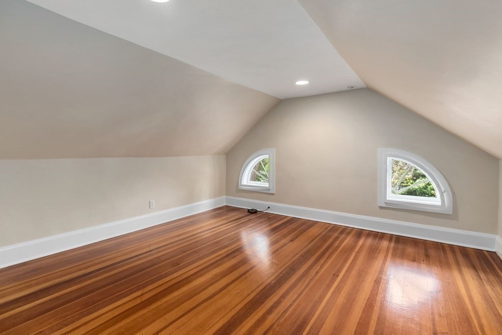 120 Forest Street Wellesley, MA 02481 - Photo 20 of 24 wooden floor in an empty room with a window