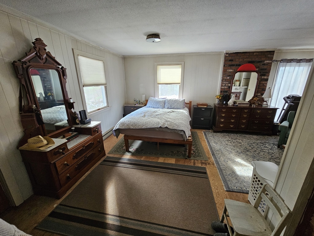 127 Summer Street Thorndike, MA 01079 - Photo 16 of 27 a bedroom with bed and window