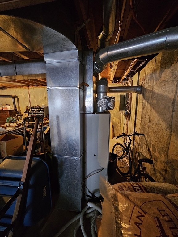 127 Summer Street Thorndike, MA 01079 - Photo 22 of 27 a view of walk in closet with clothes