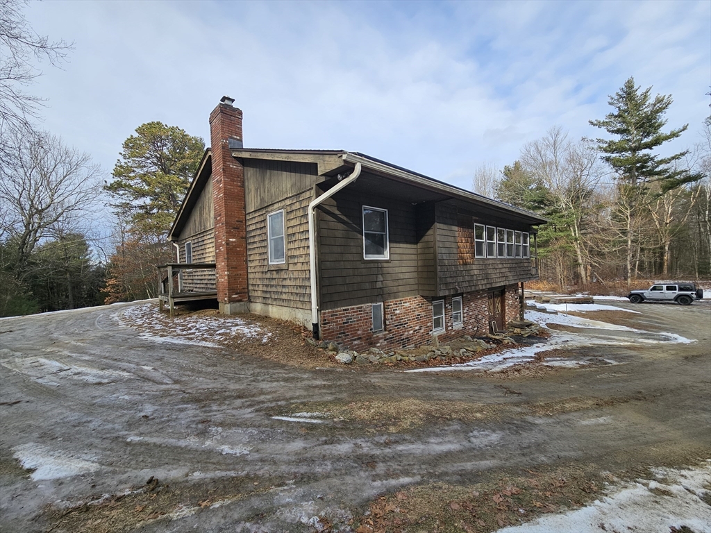 127 Summer Street Thorndike, MA 01079 - Photo 5 of 27 a front view of a house with a yard