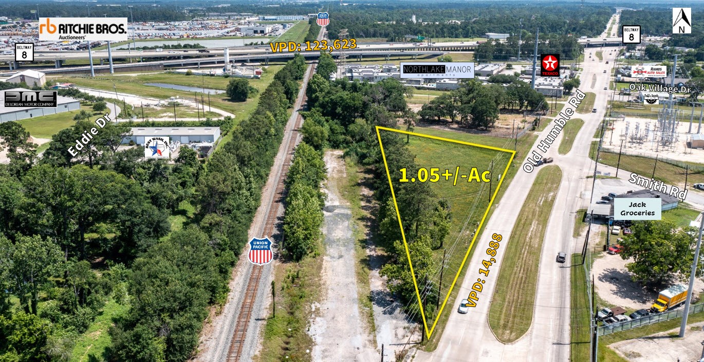 14815 Old Humble Road Houston, TX 77396 - Photo 4 of 11 a view of a swimming pool with a fountain and a bench