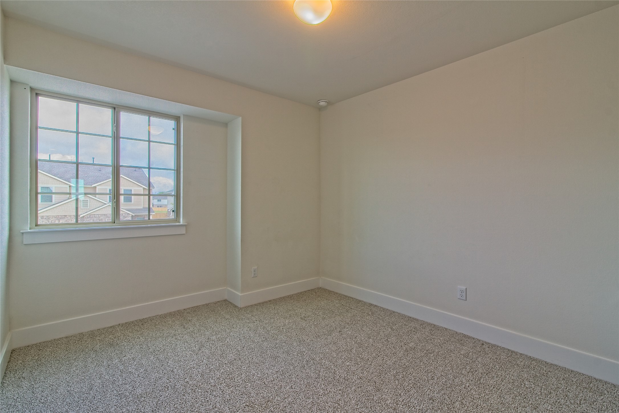 555 White Steppe Way Georgetown, TX 78626 - Photo 23 of 40 Unfurnished room with light colored carpet and baseboards