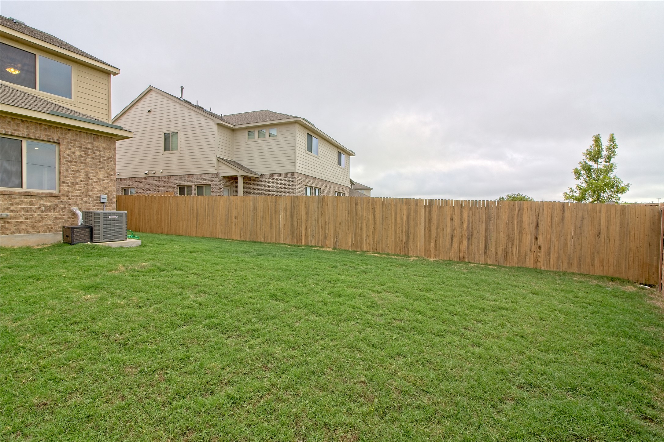 555 White Steppe Way Georgetown, TX 78626 - Photo 30 of 40 View of fenced backyard