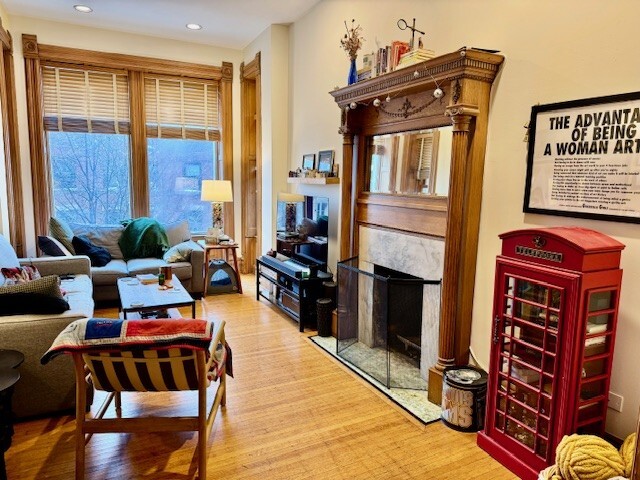 Undisclosed Address Chicago, IL 60614 - Photo 6 of 20 a living room with furniture a fireplace and a window
