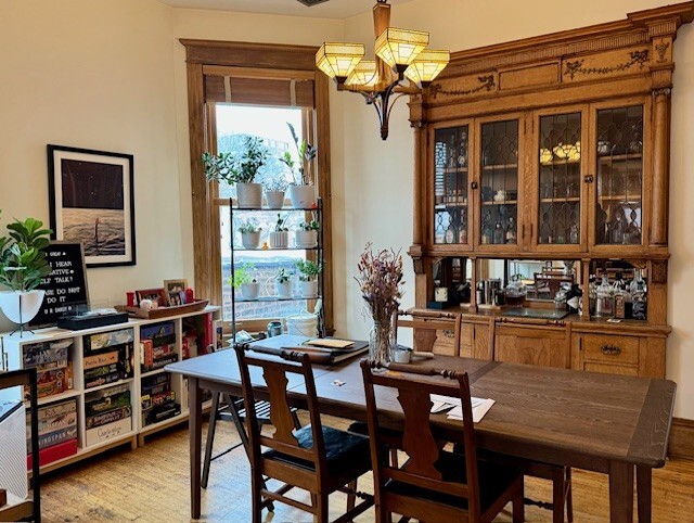 Undisclosed Address Chicago, IL 60614 - Photo 7 of 20 a view of a dining room with furniture window and outside view