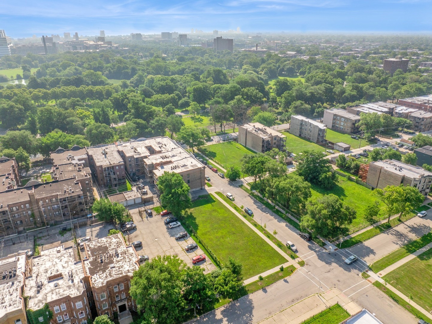5755 South Calumet Avenue Chicago, IL 60637 - Photo 16 of 19 an aerial view of residential houses with outdoor space and trees