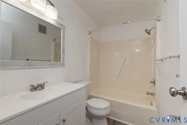 a bathroom with a sink a toilet and a bathtub