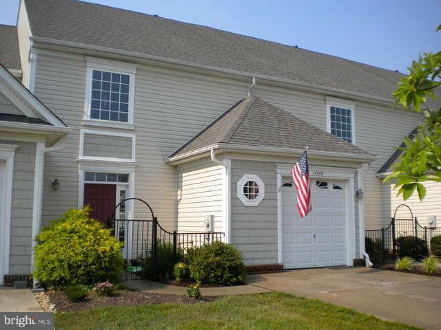 14284 Foxhall Road Dowell, MD 20629 - Photo 1 of 23 a front view of a house with garden