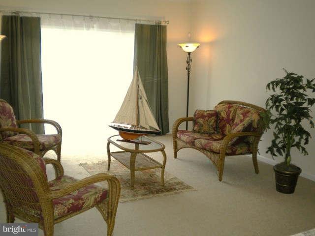 14284 Foxhall Road Dowell, MD 20629 - Photo 10 of 23 a living room with furniture and a window