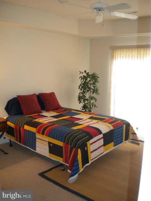 14284 Foxhall Road Dowell, MD 20629 - Photo 11 of 23 a bedroom with a bed and window