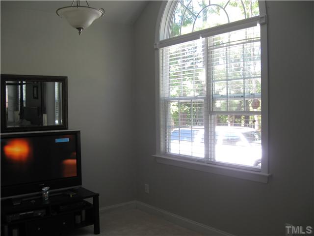 302 East Waycliff Road Henderson, NC 27537 - Photo 13 of 25 The master bedroom has a vaulted ceiling sitting alcove....plenty of room for a TV or other.